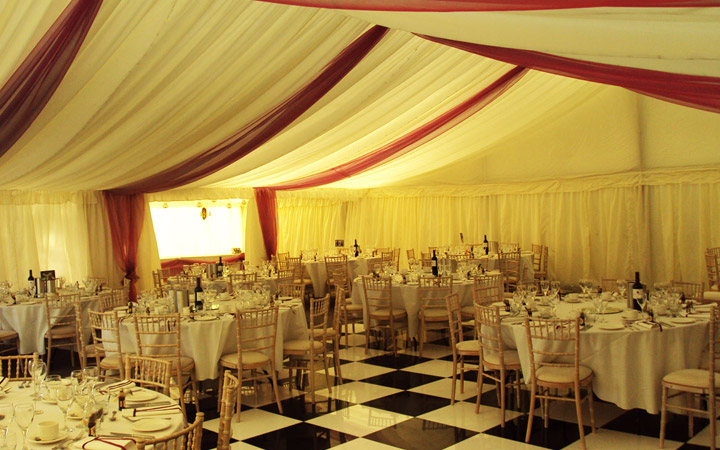 Marquee Dance Floor with Tables and Chairs